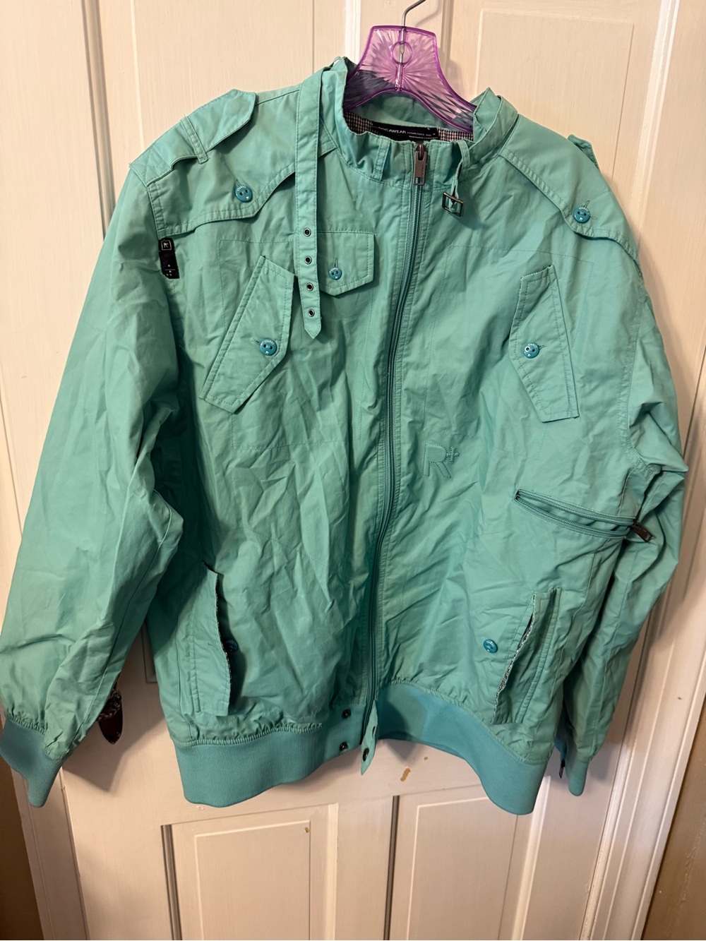 seafoam green/aqua Rocawear "R+" bomber jacket. Large